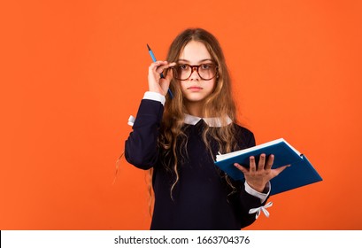 Skills and knowledge. Student with book. Learning foreign language. Education for kids. Child care. School education concept. Private college. Nerd lifestyle. Cute kid studying. Basic education.