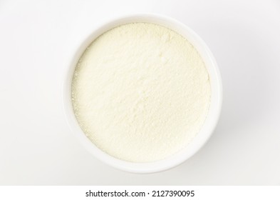 Skim Milk Powder In Cocotte On White Background