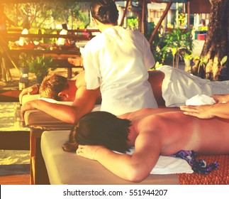 Skin And Body Care Beautiful Young Couple Enjoy Together A Massage At Beach Spa.