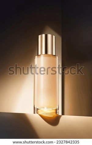 Skin care essence in aperture transparent bottle gold