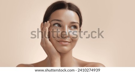 Skin Care Portrait. Woman Beauty Face on Turquoise Background