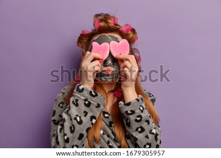 Similar – Image, Stock Photo Little girl covering eye with hand