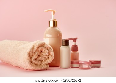 Skin care products on pink background, nobody - Powered by Shutterstock