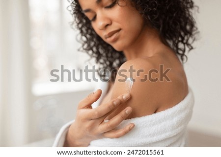 Similar – Image, Stock Photo Unrecognizable black woman touching wet ground with hand