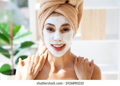 Skin Care, Woman With Beautiful Facial Skin Applying Mask On Face