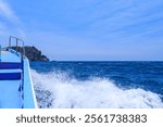 Skin divers and snorkelers take to the sea on a fishing boat on the ferry to Hirizohama beach.

Hirizohama beach, Nakagi, Minami-Izu, Izu Peninsula, Shizuoka pref - 2024.
