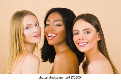 Skin tone. Multi-ethnic beauty. Different ethnicity women - Caucasian, African, Asian. Beauty. Smiling women with perfect face skin and natural makeup portrait. different types of skin