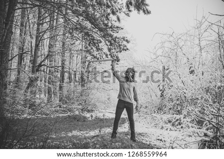 Similar – Woman walking on a fallen tree trunk