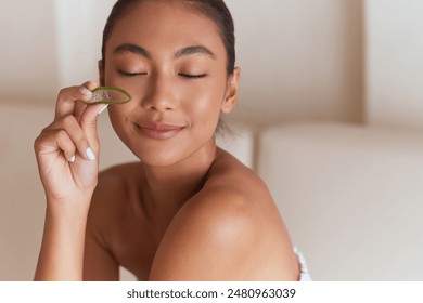 Skincare Beauty Woman . Female Enjoying Spa Treatment With Aloe Vera, Radiant Natural Beauty, Skincare Routine - Powered by Shutterstock