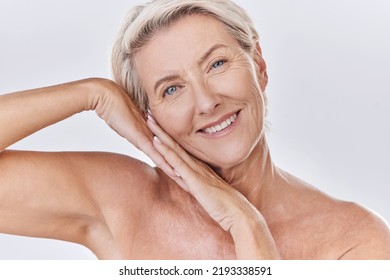 Skincare, Clean And Happy Senior Woman Face Resting On Hands In A Studio Portrait. Elderly Beauty Skin Care Model Posing Or Showing Bedtime Routine For Perfect, Healthy Looking Or Wrinkle Free Aging