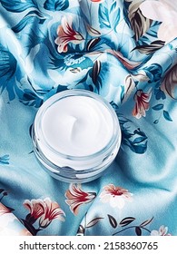 Skincare Cosmetics, Face Cream Moisturiser Jar On Blue Floral Background, Beauty Product Flatlay Close-up