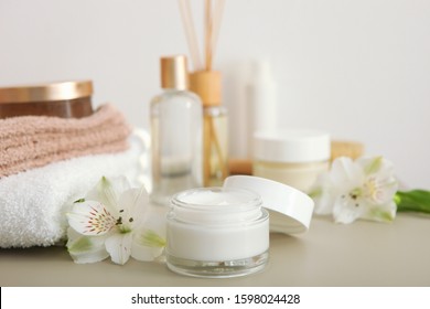 skincare cream and flowers on the table. Cosmetics for skin care.
 - Shutterstock ID 1598024428
