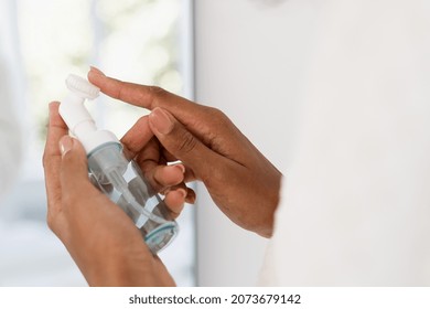 Skincare, Dermatology, Cosmetology Concept. Cropped View Of Young African American Woman Holding Silicone Brush For Face In Hands. Cleansing Foam For Washing And Skin Care, Close Up