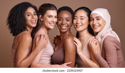 Skincare, diversity and women hug portrait for inclusivity, happiness and healthy skin texture. Interracial beauty and model group with woman in hijab smile for cosmetic campaign in brown studio - Shutterstock ID 2239225907