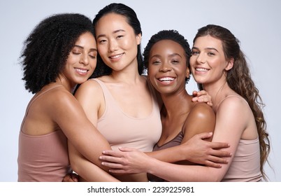 Skincare, support and diversity of women with a hug for makeup collaboration, cosmetics and beauty on a studio background. Affection, happy and portrait of model friends with cosmetic empowerment - Powered by Shutterstock