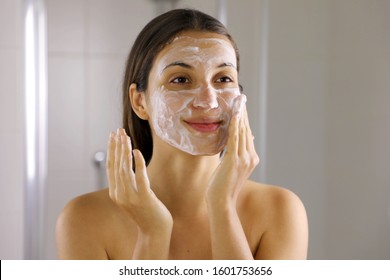 Skincare Woman Washing Face Foaming Soap Scrubbing Skin. Face Wash Exfoliation Scrub Soap Woman Washing Scrubbing With Skincare Cleansing Product. Enjoying Relaxing Time.