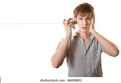 Skinny Caucasian Teen With Tin Can Phone Over White Background