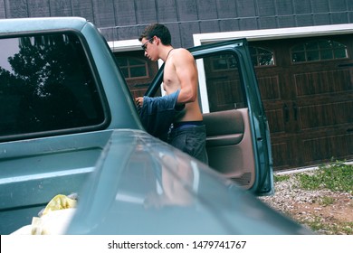 Skinny Guy Get Into A Truck After Hard Work Splitting Woods 