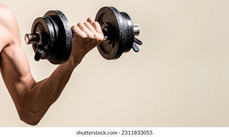 Skinny guy hold dumbbells up in hands. Thin man in sports with dumbbells. Weak man lift a weight, dumbbells, biceps, muscle, fitness. Man holding dumbbell in hand. - Shutterstock ID 2311833055