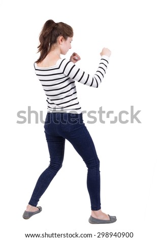 skinny woman funny fights waving his arms and legs. Isolated over white background. Frenchwoman in vest standing in a boxing pose.