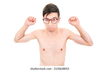 Skinny Young Man In Glasses Muscle Flexing On The White Background