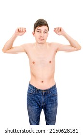 Skinny Young Man Muscle Flexing Isolated On The White Background