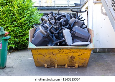 A Skip Full Of Office Chairs. Take A Seat, Office Closure. Business Closure Concept, Bankrupt