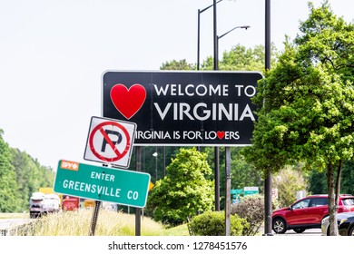 Skippers, USA - May 14, 2018: Highway road with welcome sign by Welcome Center Rest Area with Virginia is For Lovers text