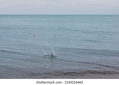 Skipping Stones In The Ocean Splash