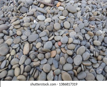 Skipping Stones On A Beach