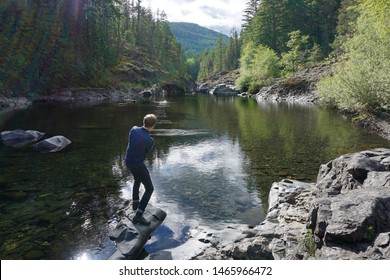 Skipping Stones On A Mountain Lake