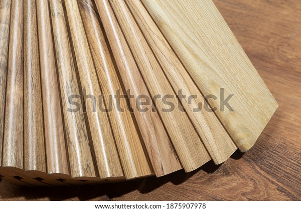Skirting board background. Samples of Skirting\
board  with a pattern and wood texture for flooring and interior\
design. Production of wooden\
floors