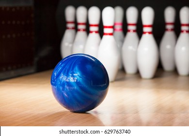 Skittles And Bowling Ball On The Playing Field