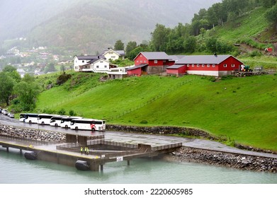 Skjolden, Sognefjord, Norway - 28th June 2022:Workers And Coaches Awaiting The Cruise Ship Docking