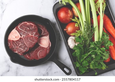 sknuckle on the bone, raw meat for ossobuco, in a cast-iron pan, baking sheet with vegetables, top view, no people, - Powered by Shutterstock