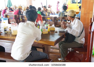 SKOUN, CAMBODIA - FEB 9, 2015 - Eating Lunch At A Truck Stop In  Skoun, Cambodia