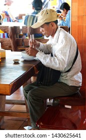 SKOUN, CAMBODIA - FEB 9, 2015 - Eating Lunch At A Truck Stop In  Skoun, Cambodia