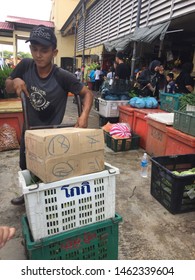 SKUDAI,JOHOR-JULY 24 2019: Indonesian Worker At Malaysia Wet Market In Skudai Johor