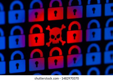 Skull and bone as a symbol of hacking programs or personal information and data. Cyber crime. Blue pixel padlock lock and red skull with bones on a black background, close-up.