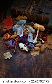 Skull, Crystals And Magic Things On Dark Wooden Background. Witchcraft Ritual For Autumn Season, Halloween, Samhain Sabbath. Mysticism, Divination, Wicca, Esoteric, Occultism Concept. Witch Altar