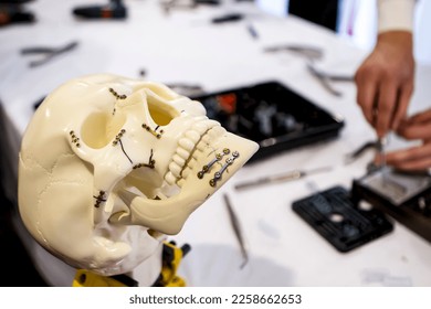 Skull models being used to train surgical residents to treat jaw fractures