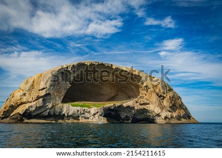 Skull Rock stone island seascape in Cruising tour view in the Bass Strait at Wilson Promontory Victoria Australia, blue sky and blue sea Foto stock © 