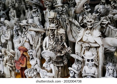 Skulls, Some Representing Our Lady Of The Holy Death Or Santa Muerte, A Mexican Deity, Are Seen For Sell In A Street Stall Of Chapultepec Public Park, Mexico City, Mexico.