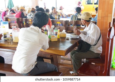 SKUON, CAMBODIA - FEB 9, 2015 - Eating Lunch At A Truck Stop In  Skuon, Cambodia