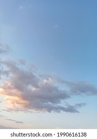 sky background with beautiful sky-blue clouds. air texture vertical image - Shutterstock ID 1990616138