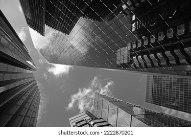 Sky between skyscrapers in black and white 