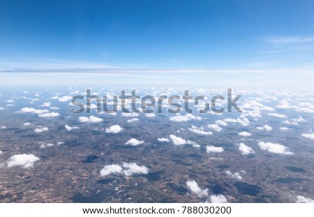 Sky blue or azure sky and cloud above landscape background. Sky is everything lies above surface atmosphere outer space. Cloud is aerosol comprising visible mass of liquid droplets frozen in air.