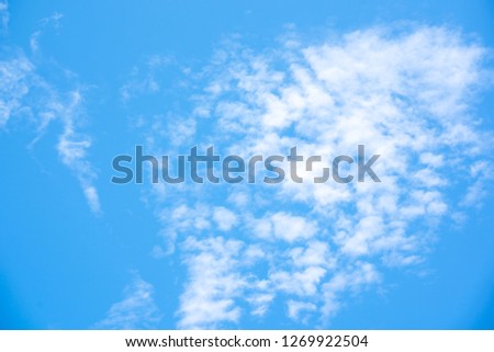 Sky blue or azure sky and clouds is bright white background. Everything lies above surface atmosphere outer space is sky. Cloud is aerosol comprising visible mass of liquid droplets frozen in air.