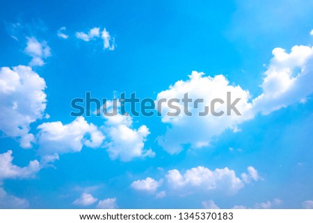 Sky blue or azure sky and clouds is bright white background. Everything lies above surface atmosphere outer space is sky. Cloud is aerosol comprising visible mass of liquid droplets frozen in air.
