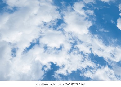Sky is blue and clear with no clouds. The sky is very bright and the sun is shining. Blue sky with scattered white clouds creating a serene and peaceful atmosphere. Ideal for backgrounds, nature theme
